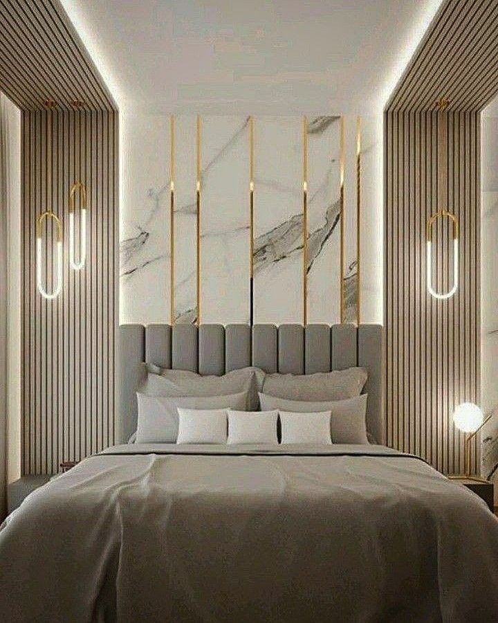 Modern bedroom with marble wall panels, gold accents, and grey fluted wall decor.